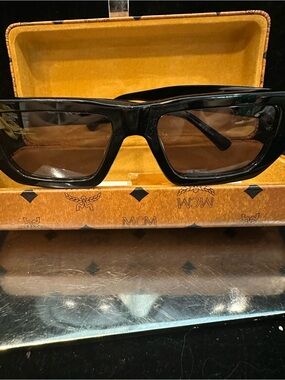 MCM  #249 Men’s Black Frame Sunglasses with Brown Lenses